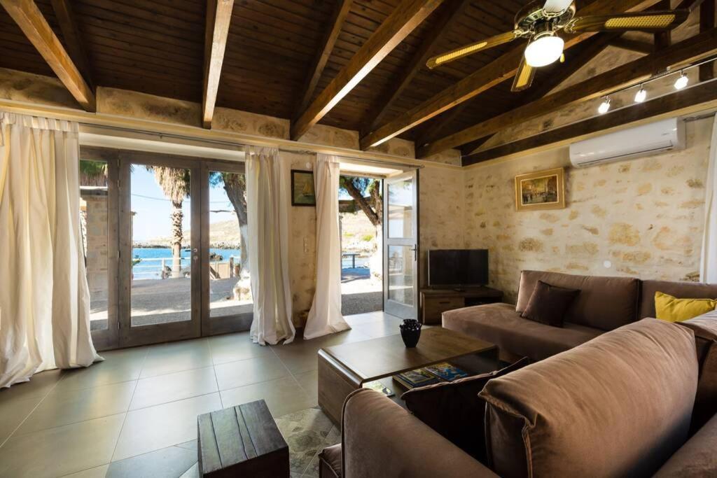 Villa Proto Helidoni - A Cozy Beachfront Villa Petres  Экстерьер фото